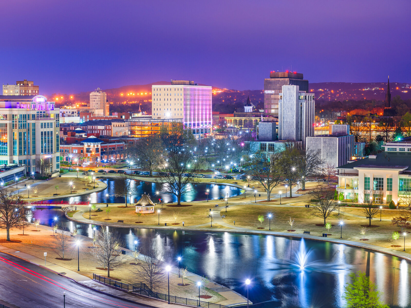 Downtown Huntsville, Alabama skyline at twilight over Big Spring Park