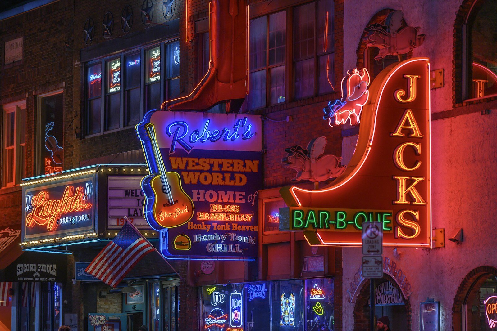 Broadway in downtown Nashville filled with neon signs